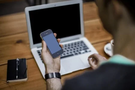 Working on Computer and Phone