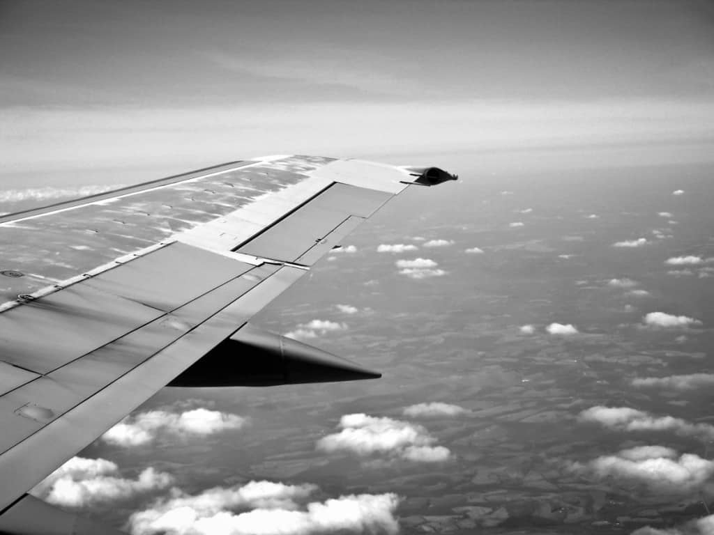 black and white airplane wing view
