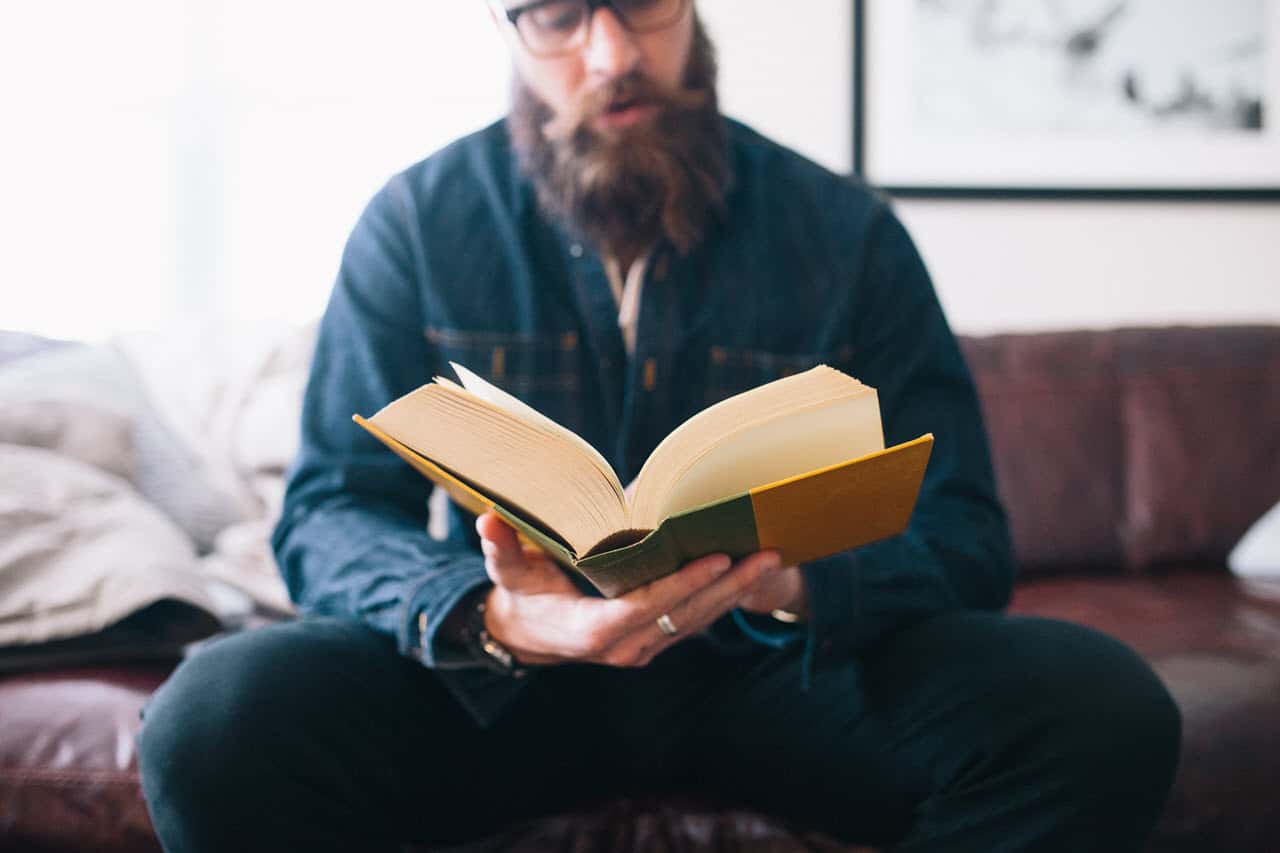 Man With Beard Reading Book