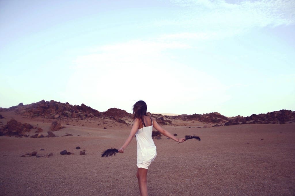 Girl Dancing in the Desert - PersonalProfitability.com