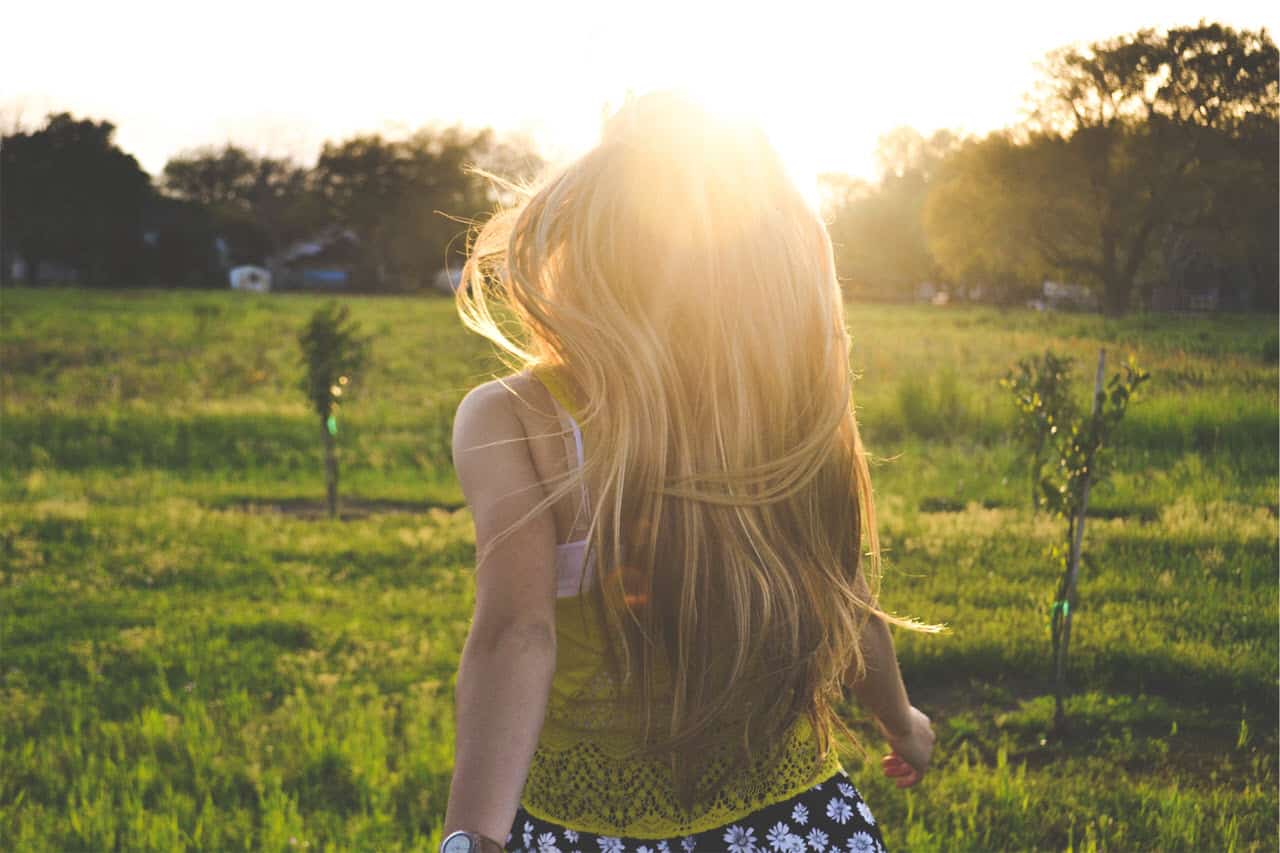 Girl in the Sun Outside PersonalProfitability.com