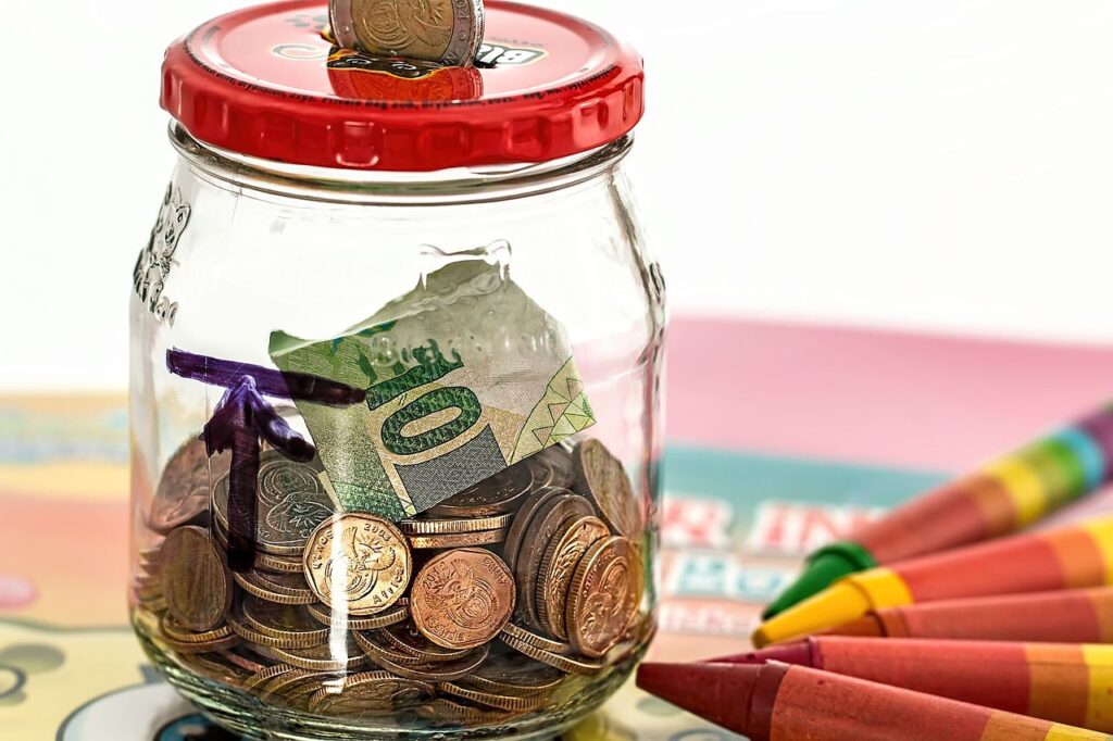 how does a high-yield savings account work, coins and cash saved in a jar